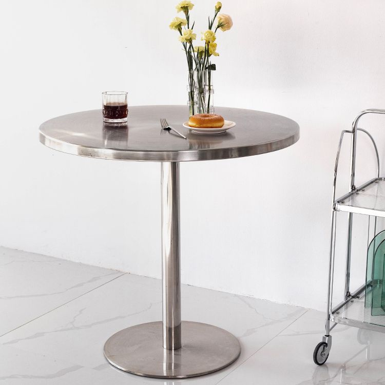 Mesa de comedor con astillas de metal Mesa de comedor de acero inoxidable con base de pedestal