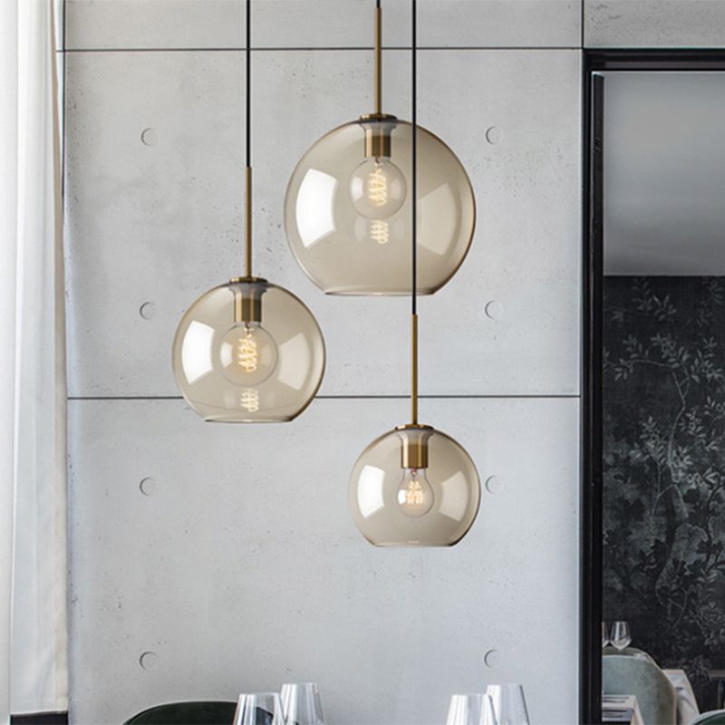 Modern Single Round Pendant Lighting, with Amber Color Glass Shade