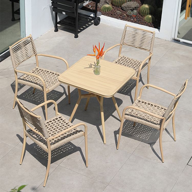 Contemporary Natural Patio Dining Side Chair with Faux Rattan Back