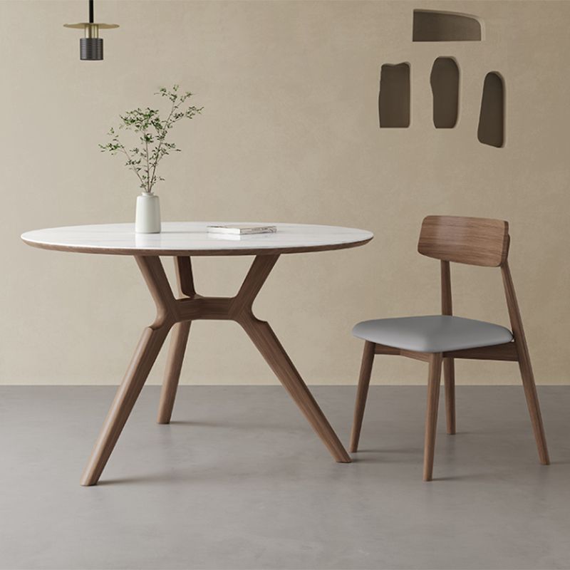 Contemporary Round White Stone Dining Table with Solid Wood Trestle