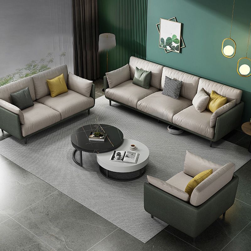 Contemporary Faux Leather Sofa with Pillows Back and Pillow Top Arm