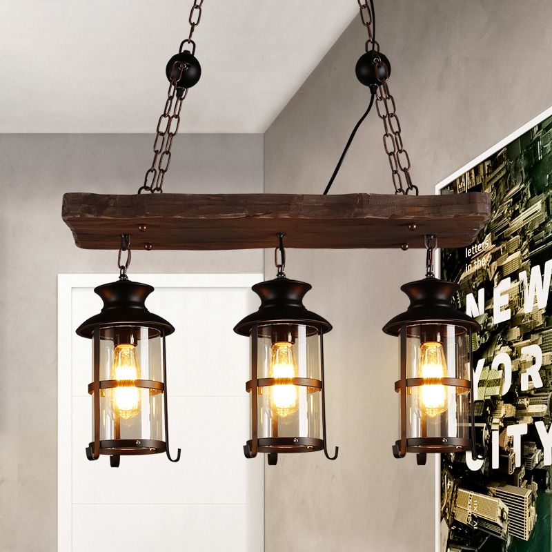 Clear Glass Lantern Island Pendant Light Industrial 2/3 Lights Bar Hanging Lamp in Black with Wood Decoration and Cage