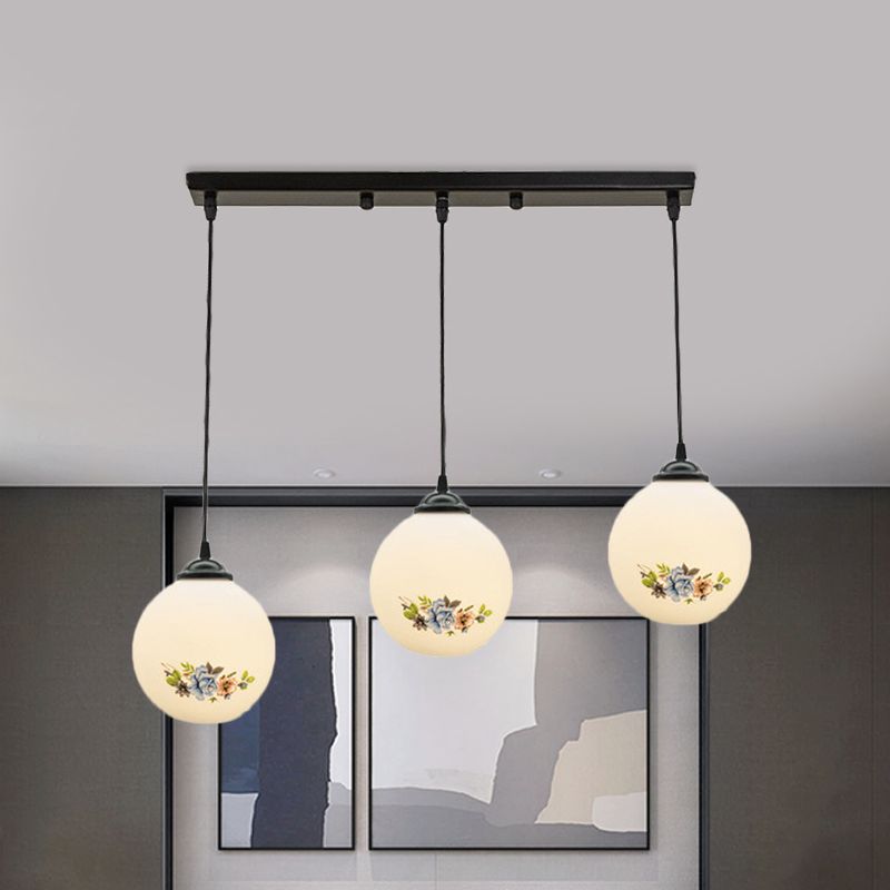 3 Heads Orb Multi-Pendant Modernism Black Finish White Frosted Glass Hanging Light Kit with Flower Pattern and Round/Linear Canopy