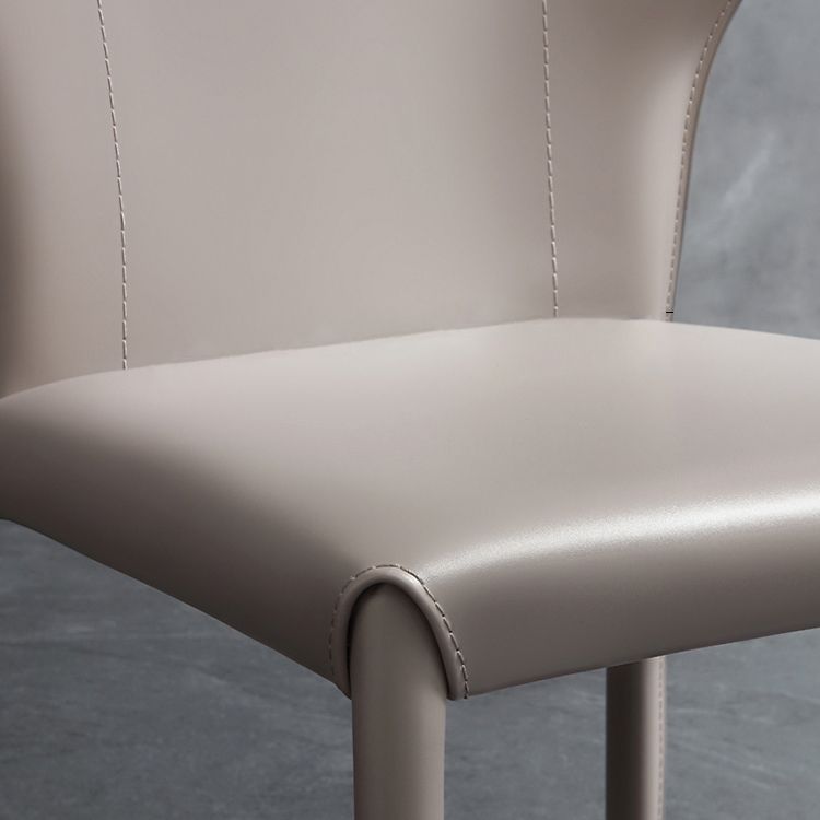 Silla lateral de comedor de cuero de estilo diseñador Silla de comedor Wingback para uso doméstico