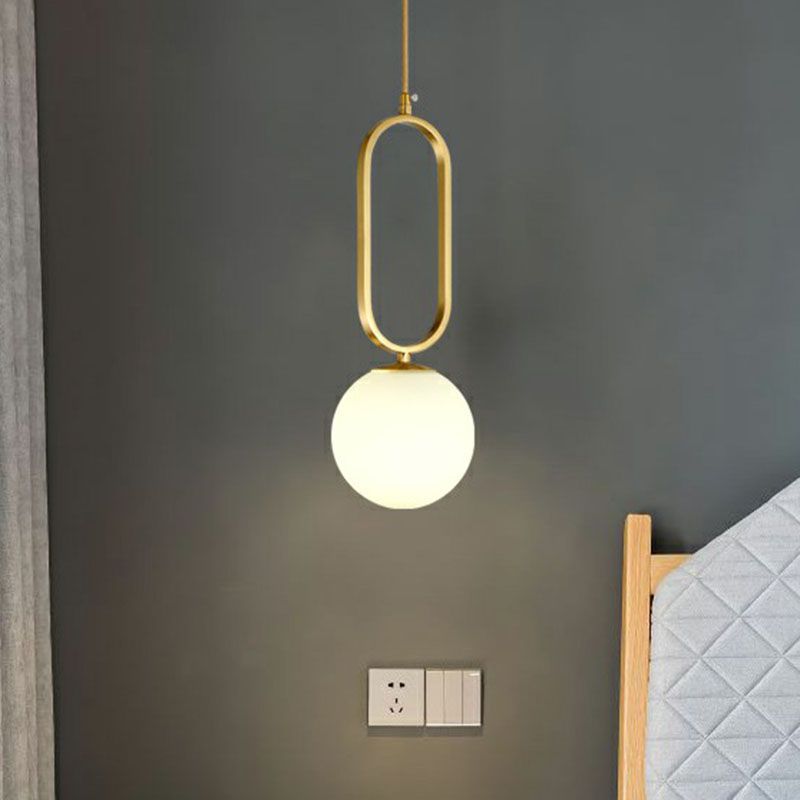 Ball Living Room Suspension Lamp Ivory Glass Single Simple Pendant Light with Oval Ring in Gold
