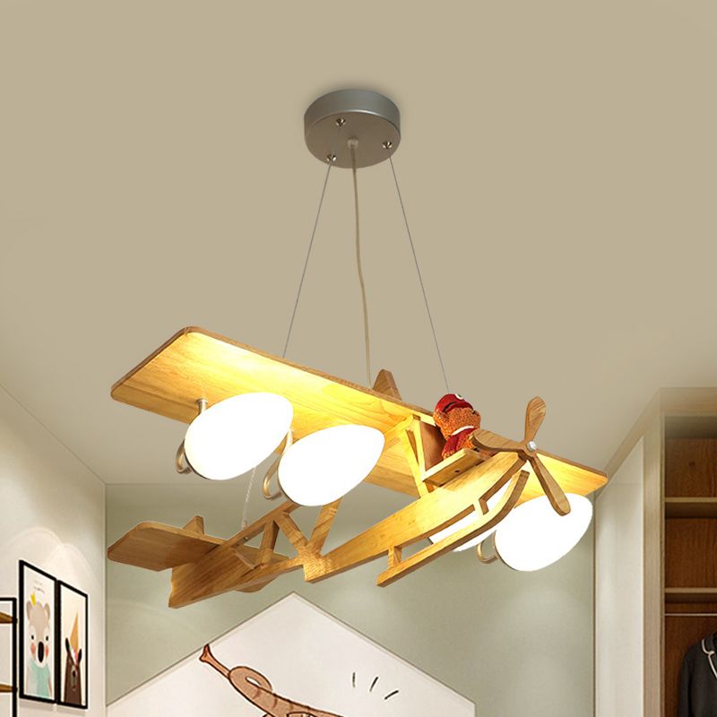 Aircraft Kids Bedroom Pendant Lighting Wood 4-Head Cartoon Chandelier in Beige with Bullet White Glass Shade