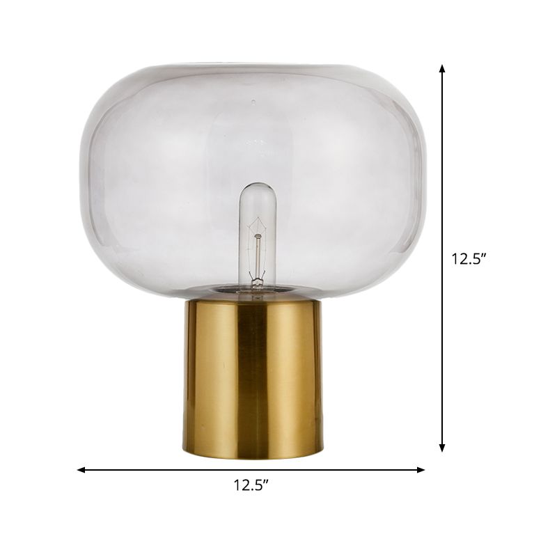 Lampada da comodino minimalista a 1 lampadina Illuminazione da tavolo ovale in metallo dorato con paralume in vetro grigio fumo