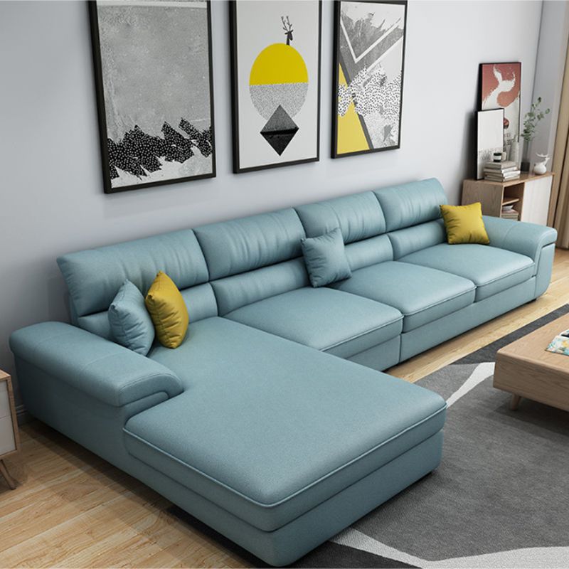 Blue L-Shape Sectional with Pillow Top Arm and Pillows Back for Four People