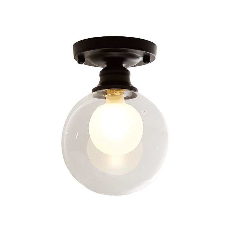 Lampada da soffitto sferica a semi-incasso in vetro. Semplice plafoniera nera a semi-incasso