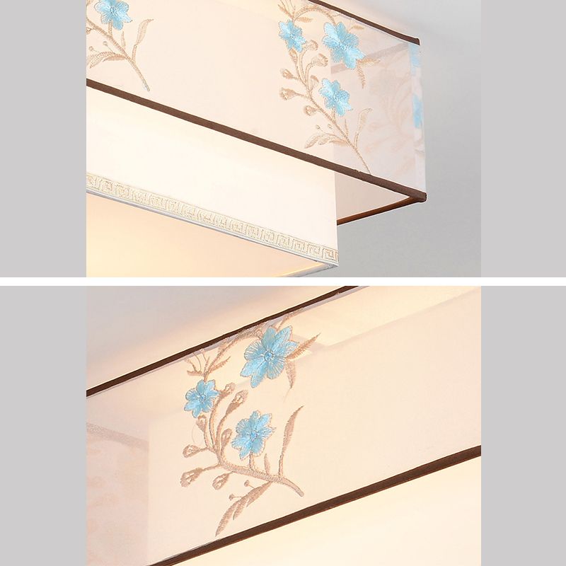 Plafonnier géométrique blanc en fer forgé de style minimaliste traditionnel avec abat-jour en tissus brodés