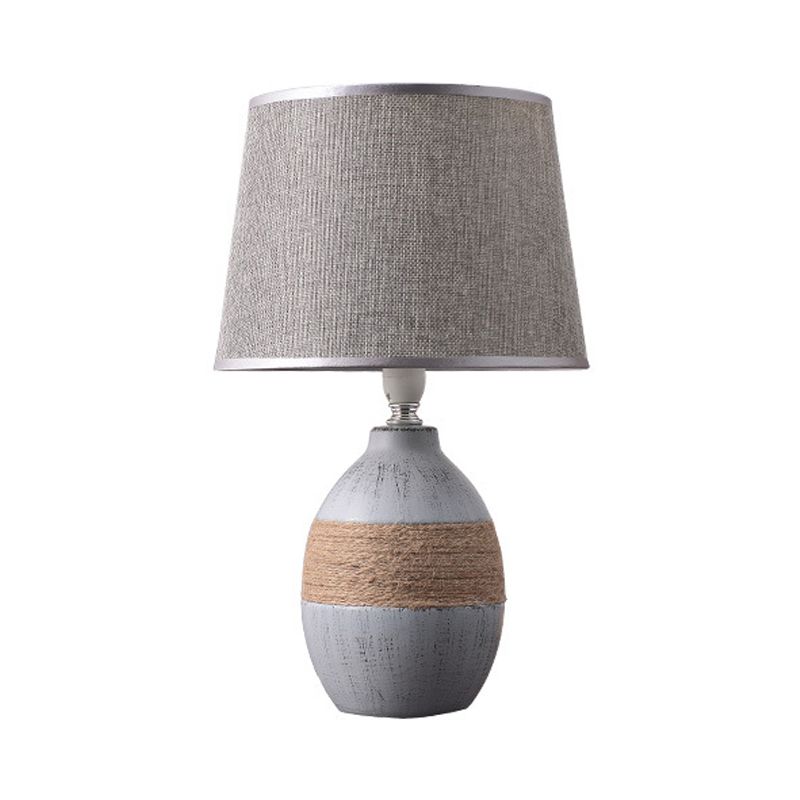 Flaxen/grijze 1-licht nachtkastje Lamp Traditionele stof Drum Desk Licht met trapezoid/ovaal/Globe keramische basis