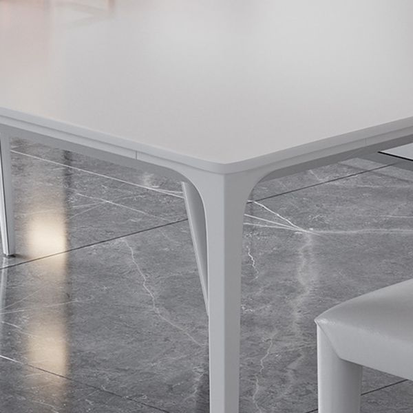Table rectangulaire contemporaine en métal blanc table à manger en pierre fritrée avec 4 jambes