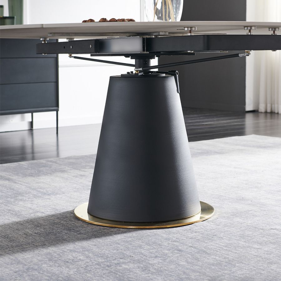 Mesa de comedor de lujo tradicional mesa de pedestal de piedra sinterizada con base de metal