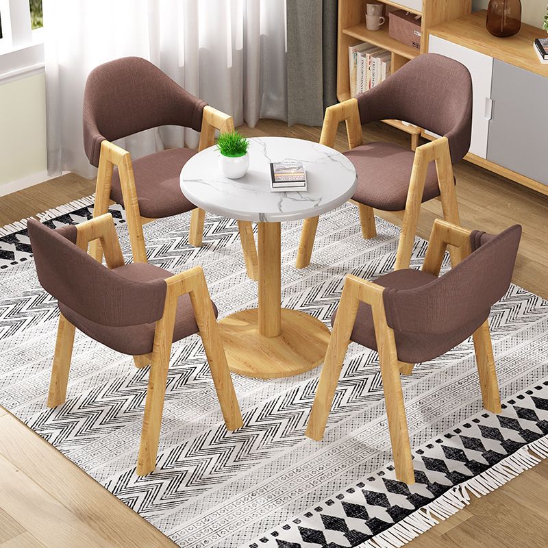 Silla de comedor tapizada escandinava con respaldo abierto y acabado mate (juego de 4)