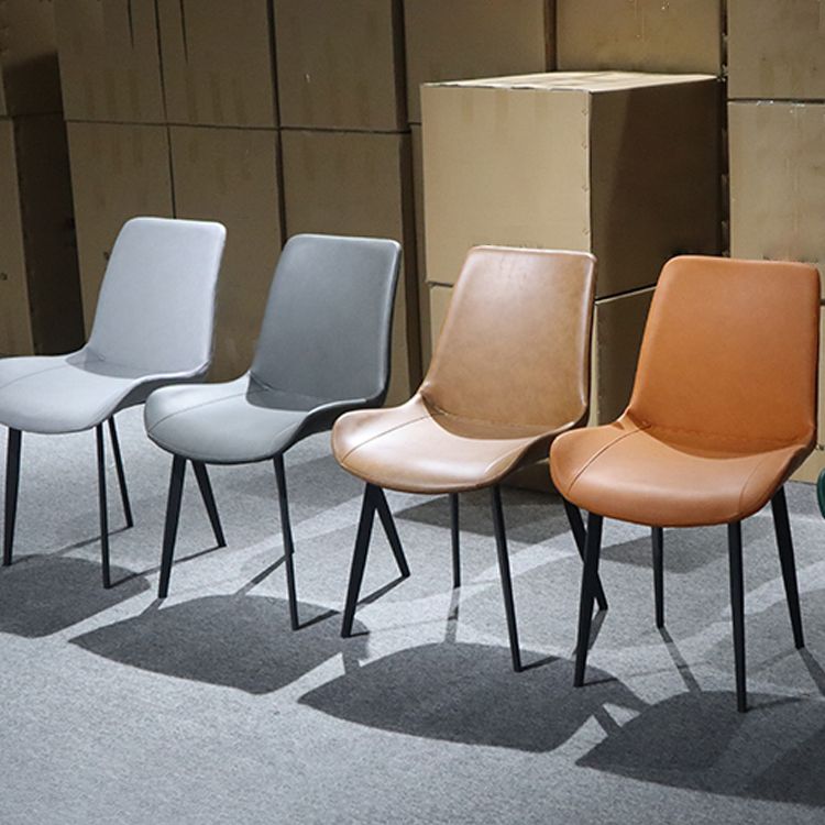 Silla lateral de cuero contemporánea para restaurante Silla de comedor con respaldo sólido