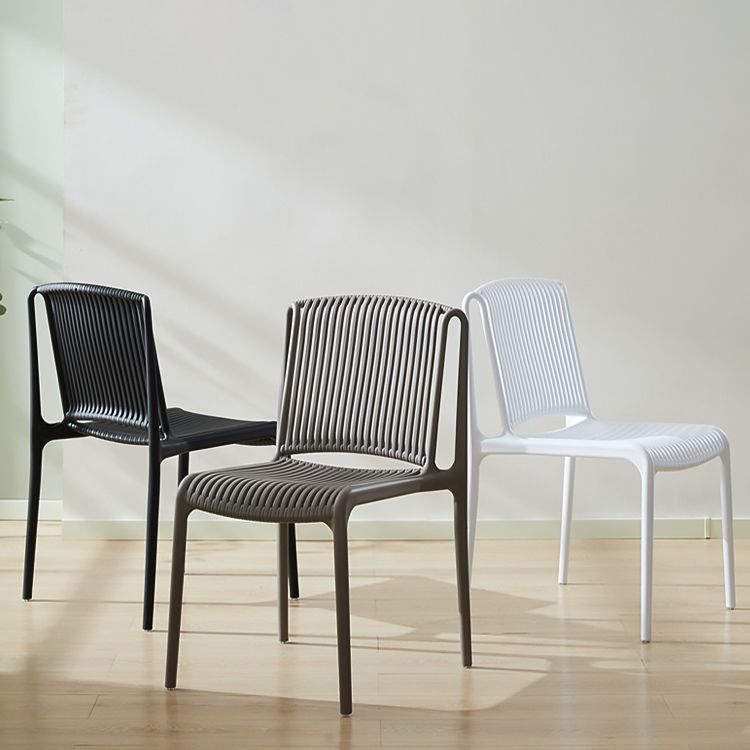 Silla de comedor sin brazos apilable escandinava, silla lateral con respaldo de listón de plástico