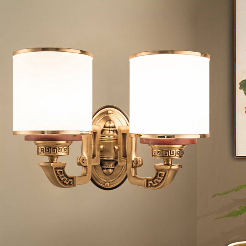 White Glass Cylinder Wall Mount Lamp Traditional 2 Bulbs Living Room Sconce Lighting in Brass