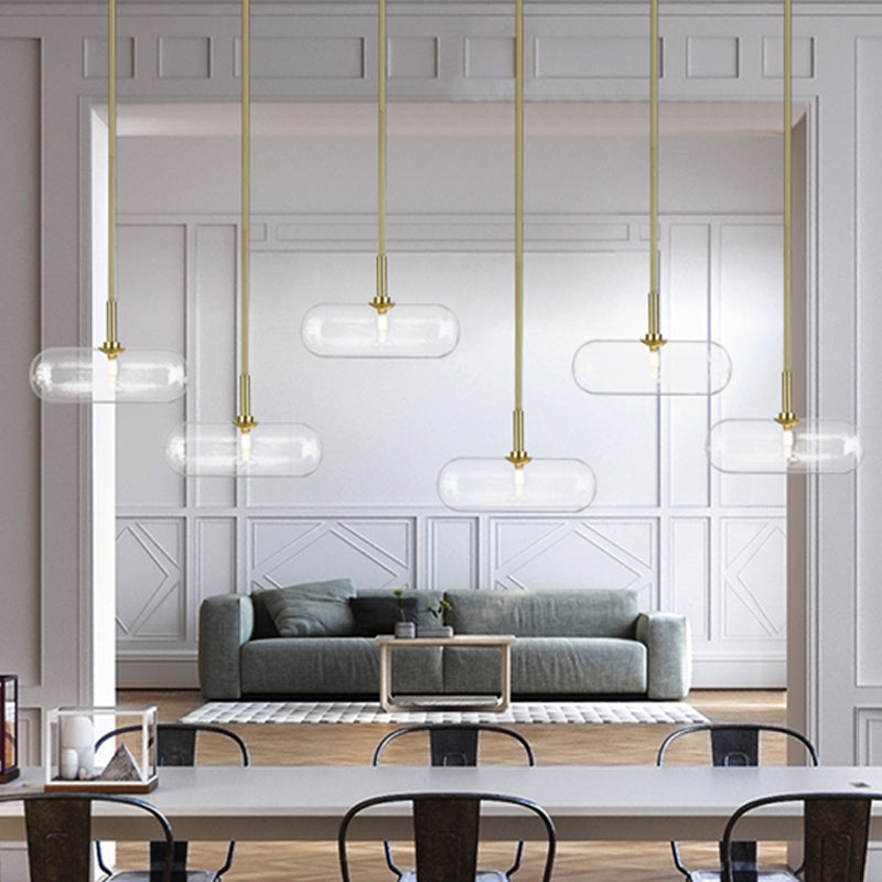 Minimalist Capsule Clear Glass Pendant Single-Bulb Suspended Lighting Fixture in Gold