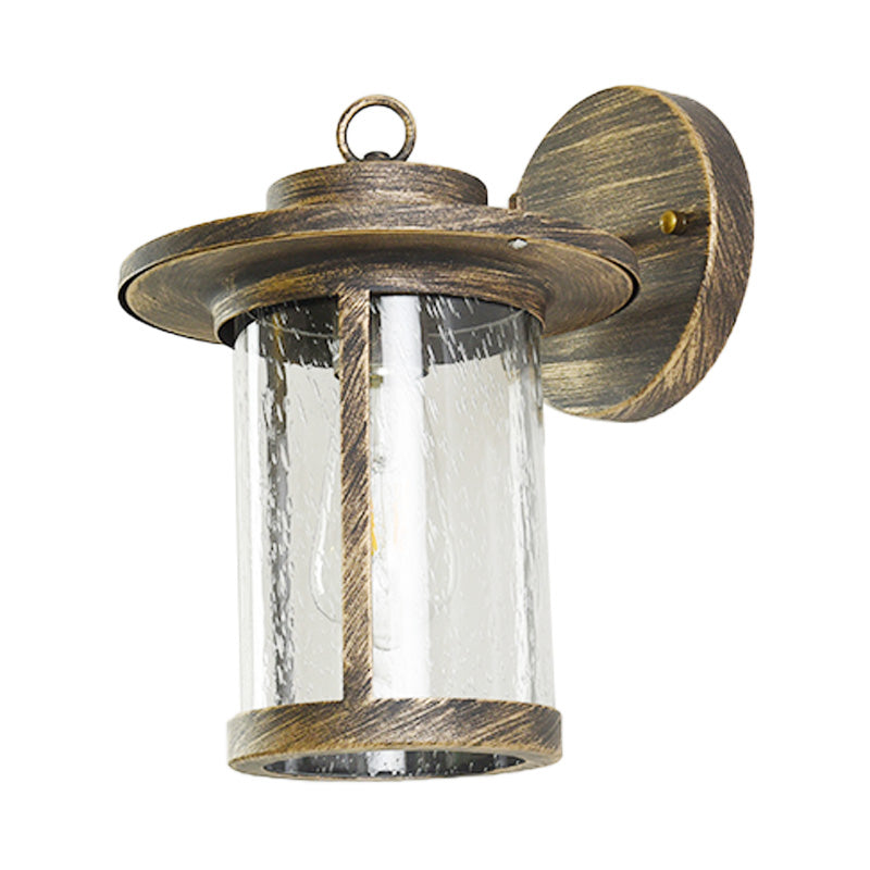 Cylinder Seeded Glass Wall Mounted Lamp Industrial Single Bulb Porch Sconce Light in Matte Black/Bronze with Cage