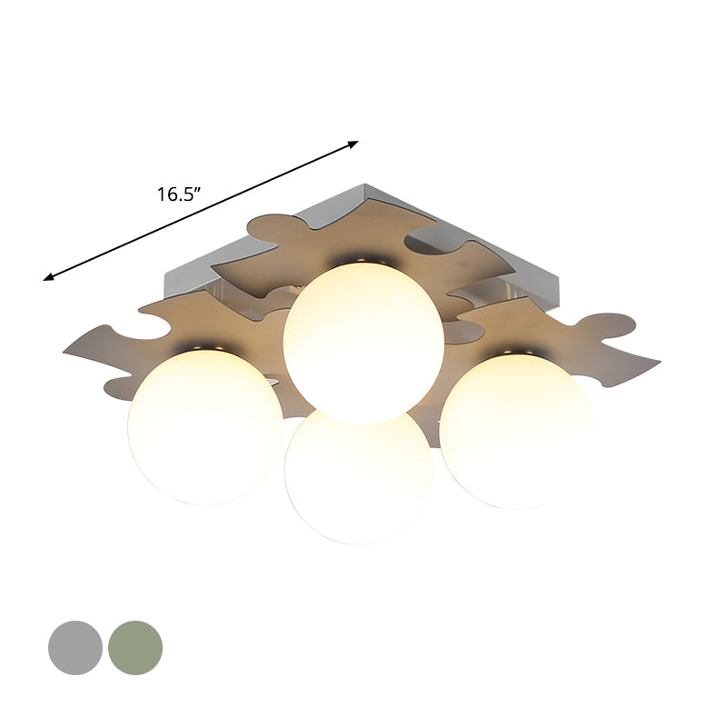 Globe di vetro bianco semi-filo modernista Modernist 4-bulb Luce a filo con decorazione puzzle in grigio/verde