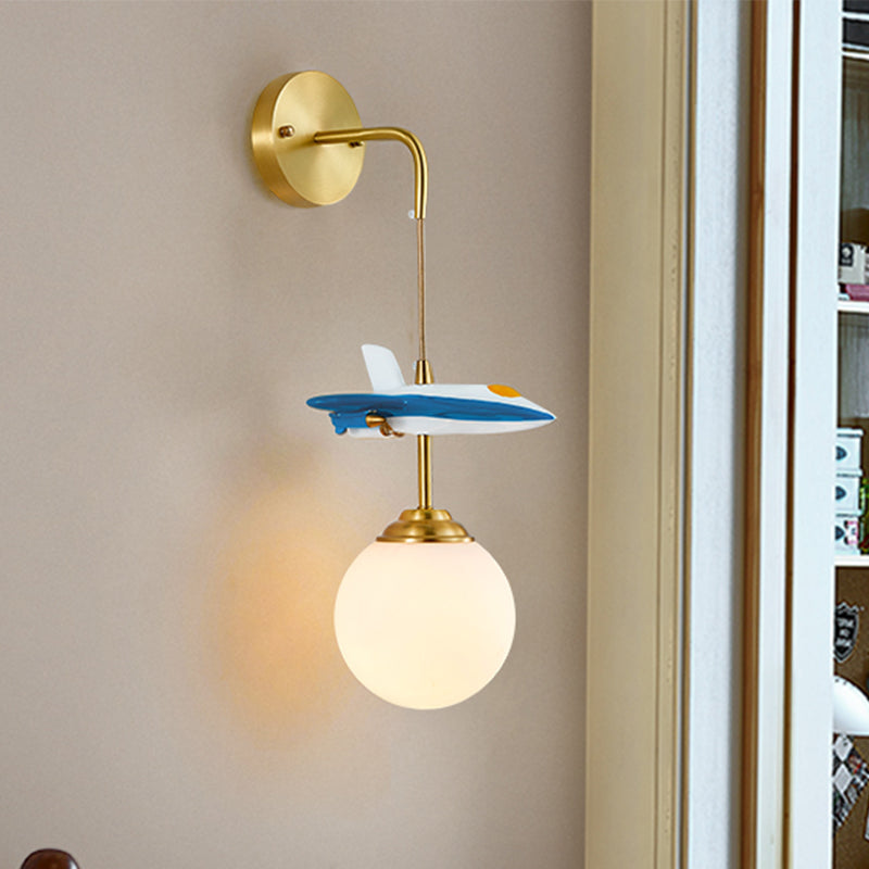 White Glass Globe Wall Lighting Cartoon 1-Light Wall Light Fixture with Plane Decor in Brass