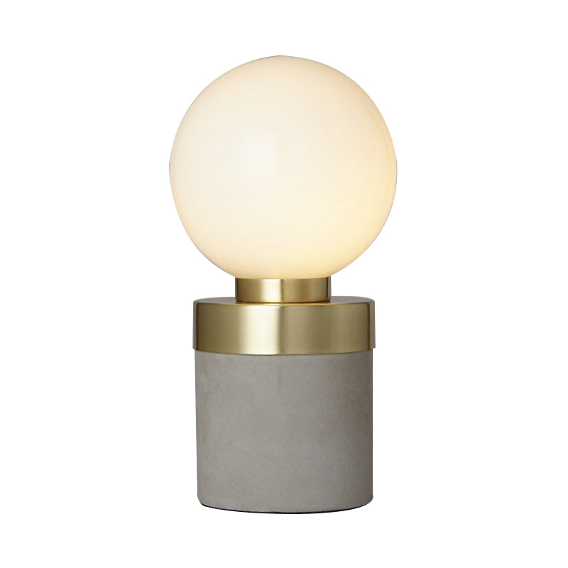 Éclairage de table en verre givré mondial Élevant 1 lampe de table gris clair avec base de cylindre de ciment