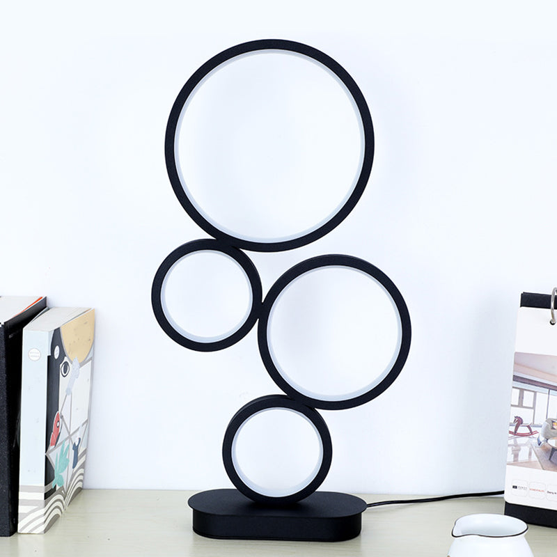 Lampada da tavolo rotonda semplice Implesatura Metallic LED Illuminazione notturna con piedistallo circolare in luce nera, calda/bianca