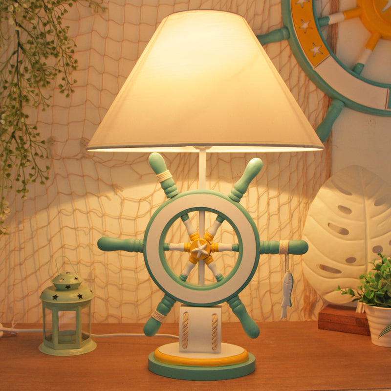 Lampada da tavolo per bambini in resina timone Lampada da scrivania a testa singola rosa/verde con paralume in tessuto bianco a botte