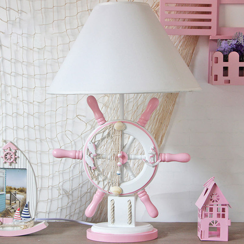 Lampada da tavolo per bambini in resina timone Lampada da scrivania a testa singola rosa/verde con paralume in tessuto bianco a botte