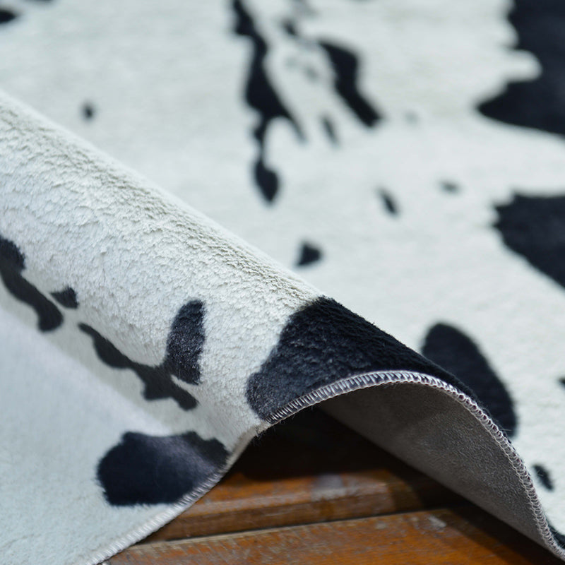 Tapis de chambre à coucher noir tapis motif de peau de vache moderne polyester le support de support antidérapant le tapis lavable