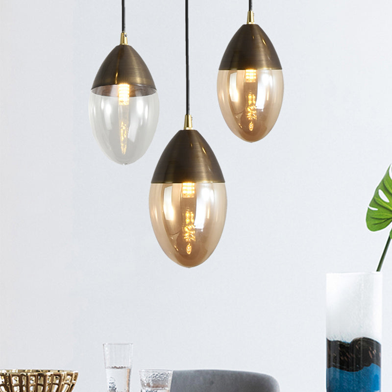 Colgante de suspensión elipsoides posmodernos Clear/Amber Glass Led Dinging Room Techo colgado Luz