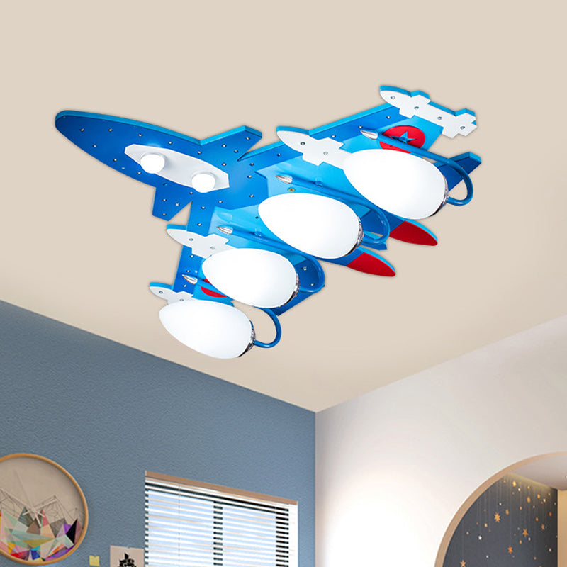 Blue Aircraft Flush Mounted Lamp Cartoon 4 Lights Wooden Ceiling Fixture with Oval Cream Glass Shade