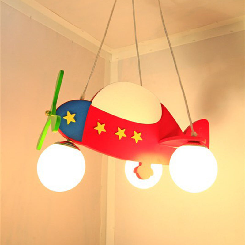 Cartoon Helicopter Chandelier Lighting Wooden 3 Bulbs Kids Room Hanging Light in Red with Ball Milk Glass Shade