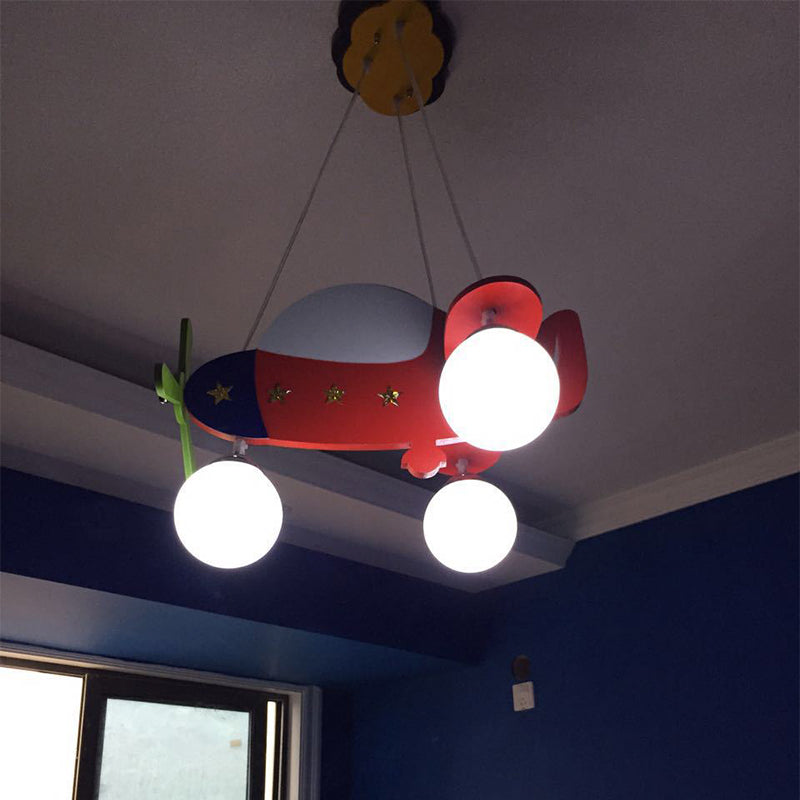 Cartoon Helicopter Chandelier Lighting Wooden 3 Bulbs Kids Room Hanging Light in Red with Ball Milk Glass Shade
