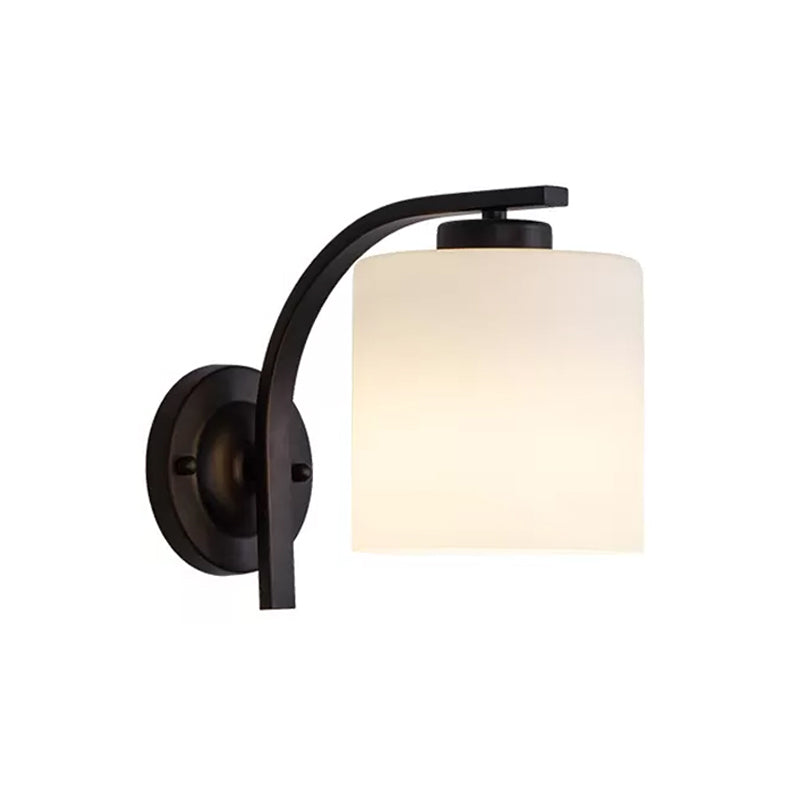 Black 1-Light Wall Sconce Simple Ivory Glass Cylinder Wall Mounted Lamp with Curved Arm
