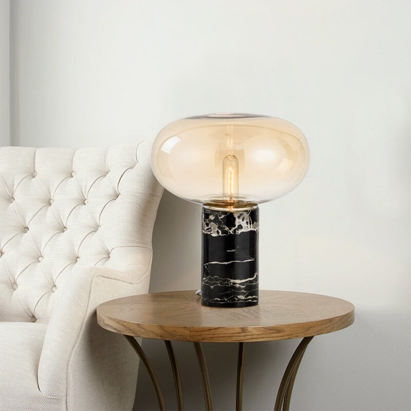 Lampada da tavolo da soggiorno ovale postmoderna in vetro grigio/ambra con 1 lampadina con base cilindrica in marmo nero