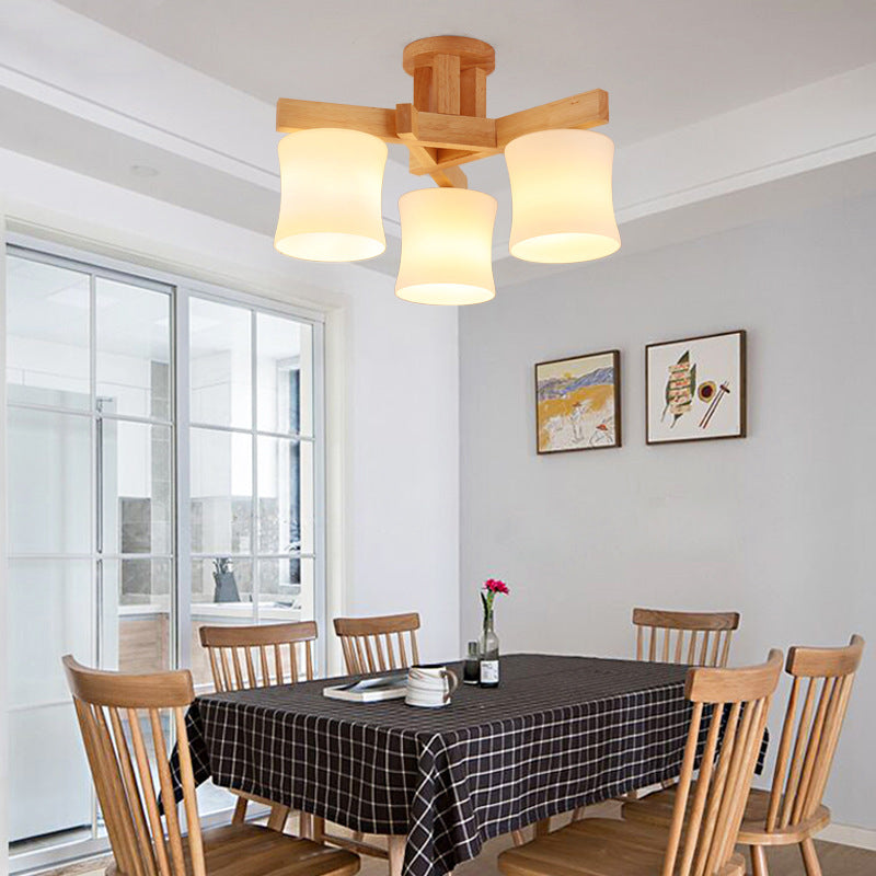 Lámpara semi empotrada cilíndrica de vidrio opal, montaje empotrado en techo beige contemporáneo con dosel de madera