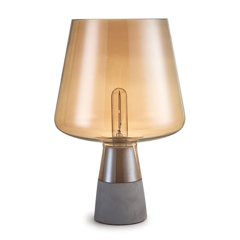 Lampada rustica simile a un coglione da comtorente in vetro ambra a bulbo singola illuminazione da camera da letto con base di cemento