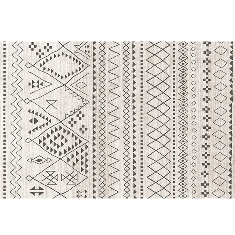 Tapis de synthèse multicolore de tapis de synthétique multicolore géo de géo.