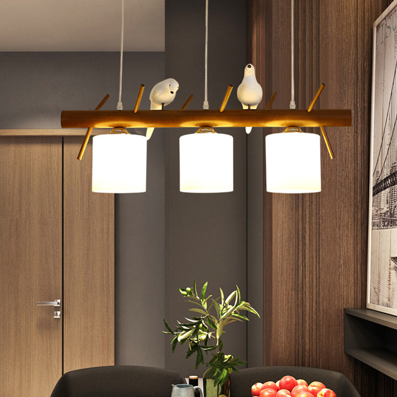 Cylinder Restaurant LED Pendant Light White Glass Simplicity Hanging Island Light with Resin Bird