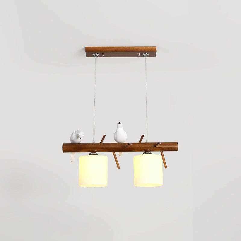 Cylinder Restaurant LED Pendant Light White Glass Simplicity Hanging Island Light with Resin Bird