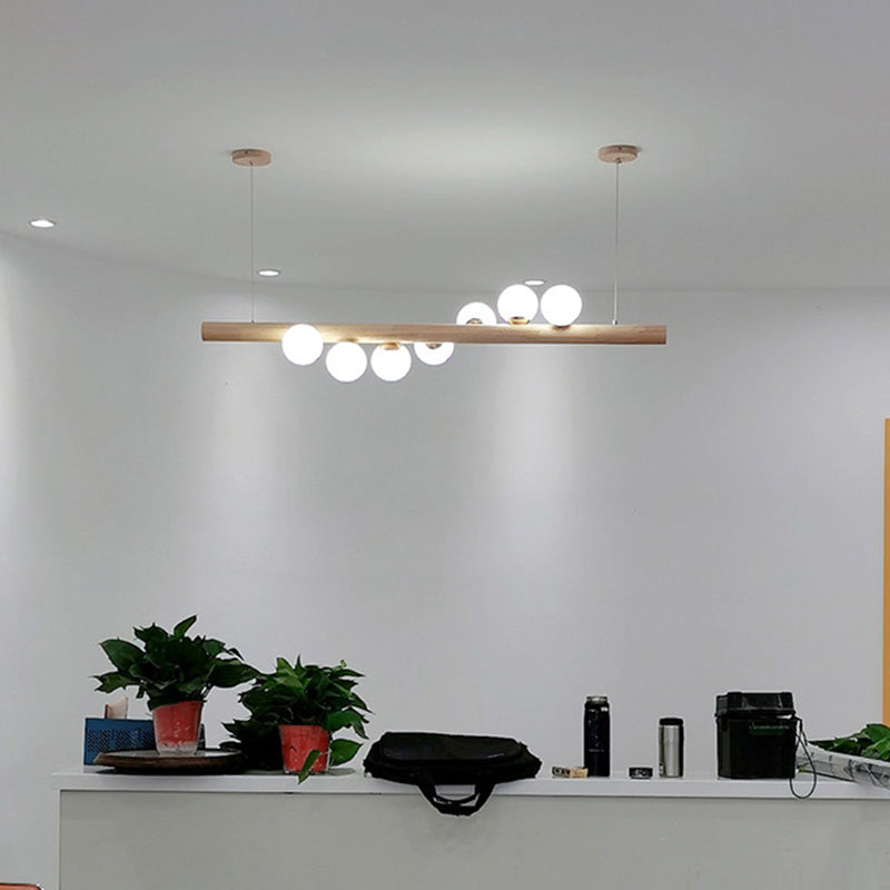 Ball Island Pendant Light Minimalist Cream Glass Restaurant LED Ceiling Light in Wood