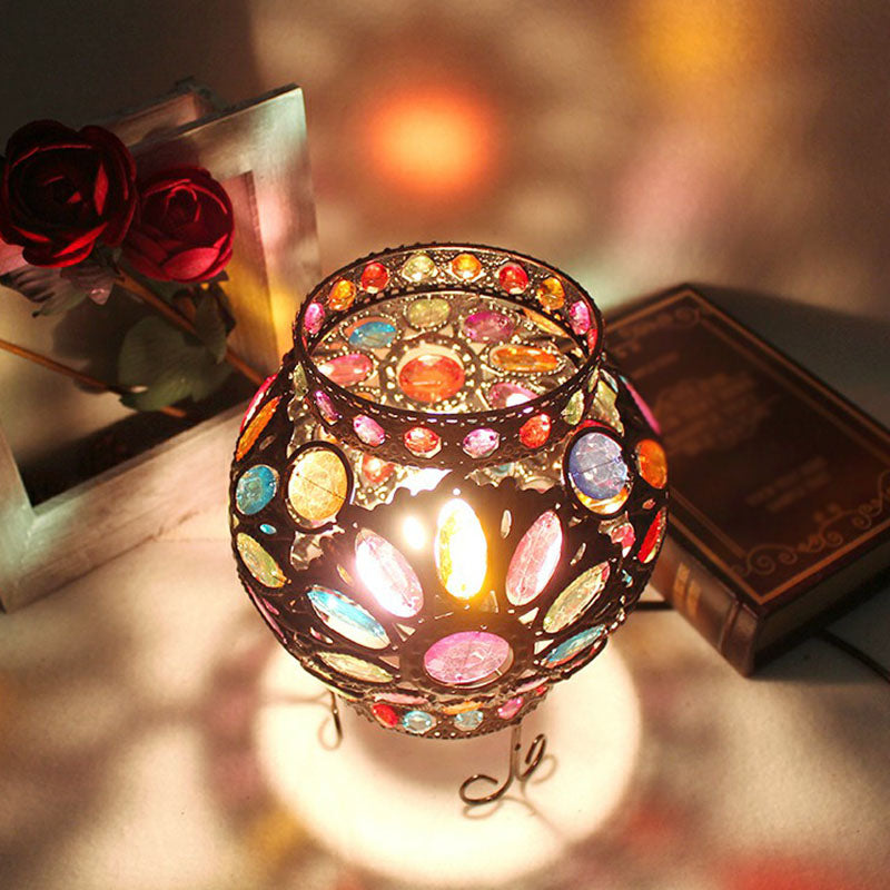 Oblate ijzeren tafelverlichting traditionele 1-licht slaapkamer nachtkastje lamp met acrylkraal in brons