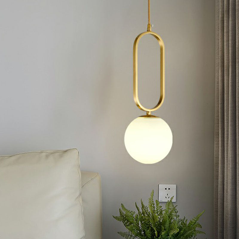 Ball Living Room Suspension Lamp Ivory Glass Single Simple Pendant Light with Oval Ring in Gold