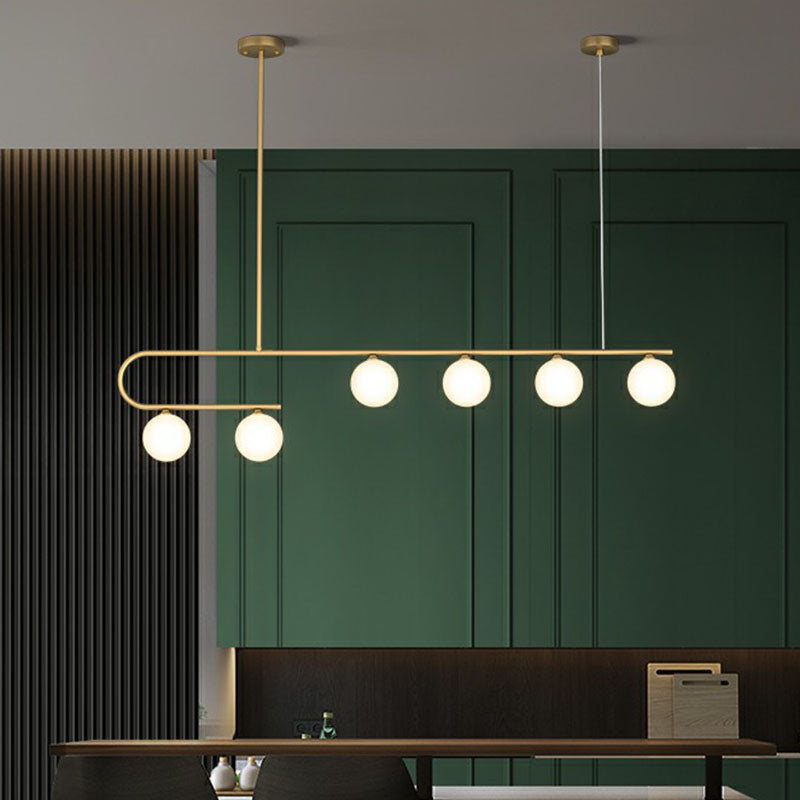 Linear Restaurant Island Pendant Light Ivory Ball Glass Postmodern LED Hanging Lamp in Gold