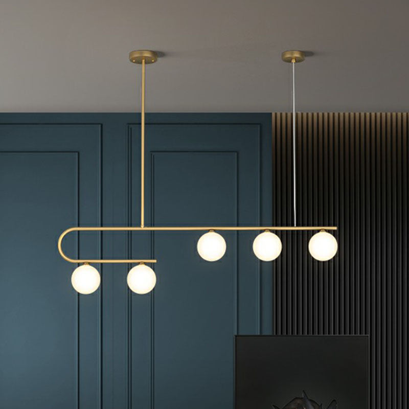 Linear Restaurant Island Pendant Light Ivory Ball Glass Postmodern LED Hanging Lamp in Gold