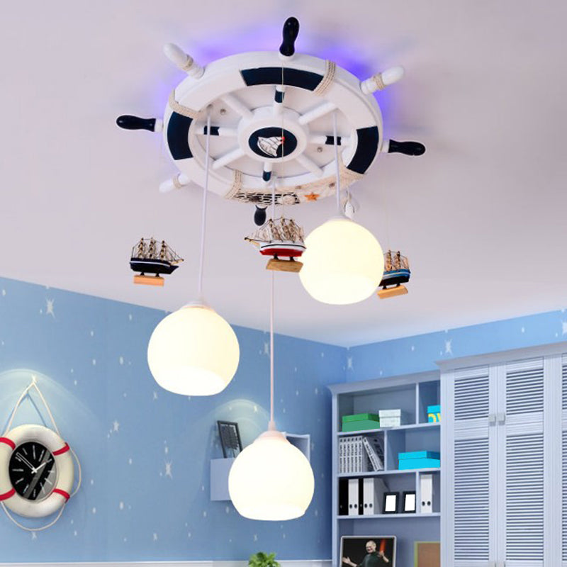 Globe Flush Ceiling Light Cartoon Cream Glass 3 Bulbs Child Room LED Flush Mount Lighting with Rudder Decor