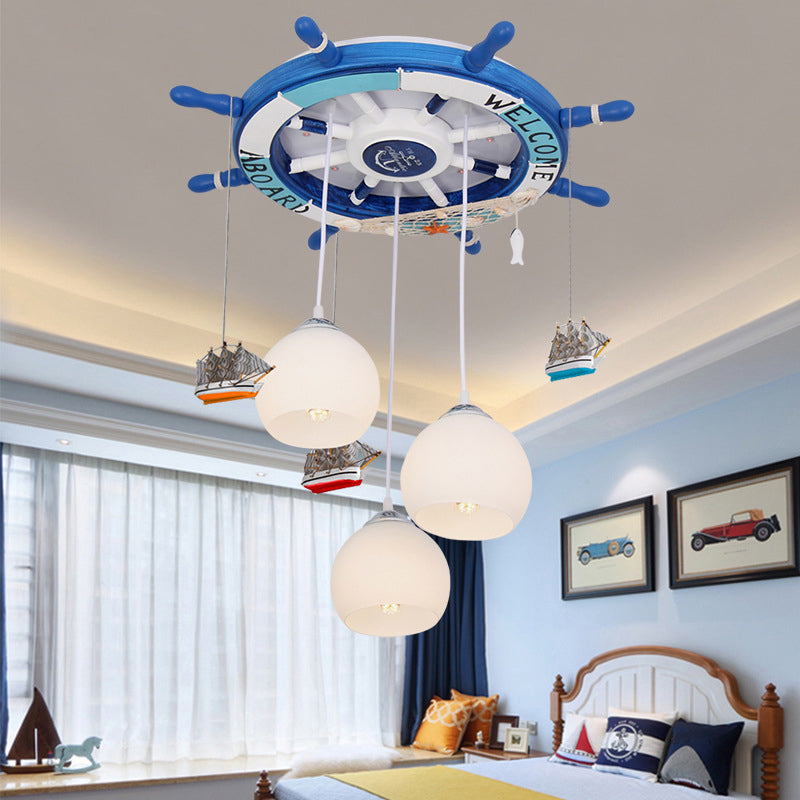 Globe Flush Ceiling Light Cartoon Cream Glass 3 Bulbs Child Room LED Flush Mount Lighting with Rudder Decor