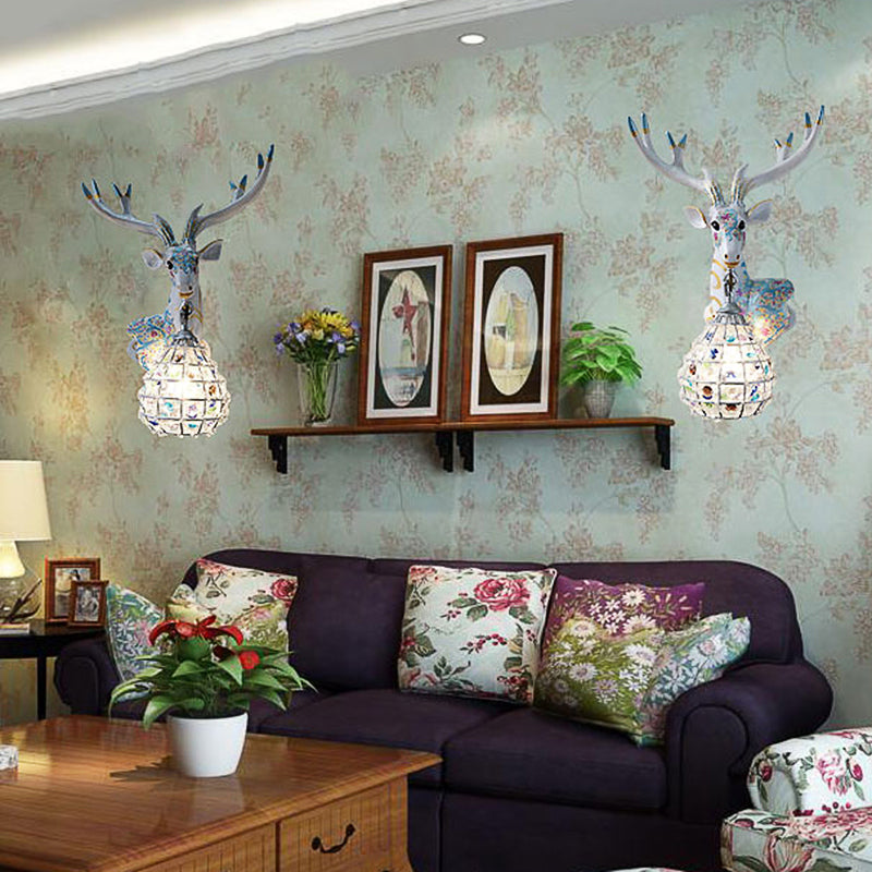 Application de cerf traditionnelle 1 Éclairage mural en résine lumineuse en noir / rose / jaune pour chambre avec une nuance de cristal de gouttelettes, droite / gauche