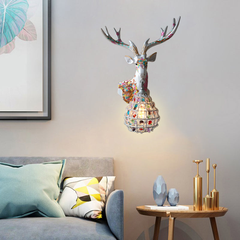 Application de cerf traditionnelle 1 Éclairage mural en résine lumineuse en noir / rose / jaune pour chambre avec une nuance de cristal de gouttelettes, droite / gauche